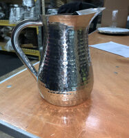 Hammered silver water pitcher